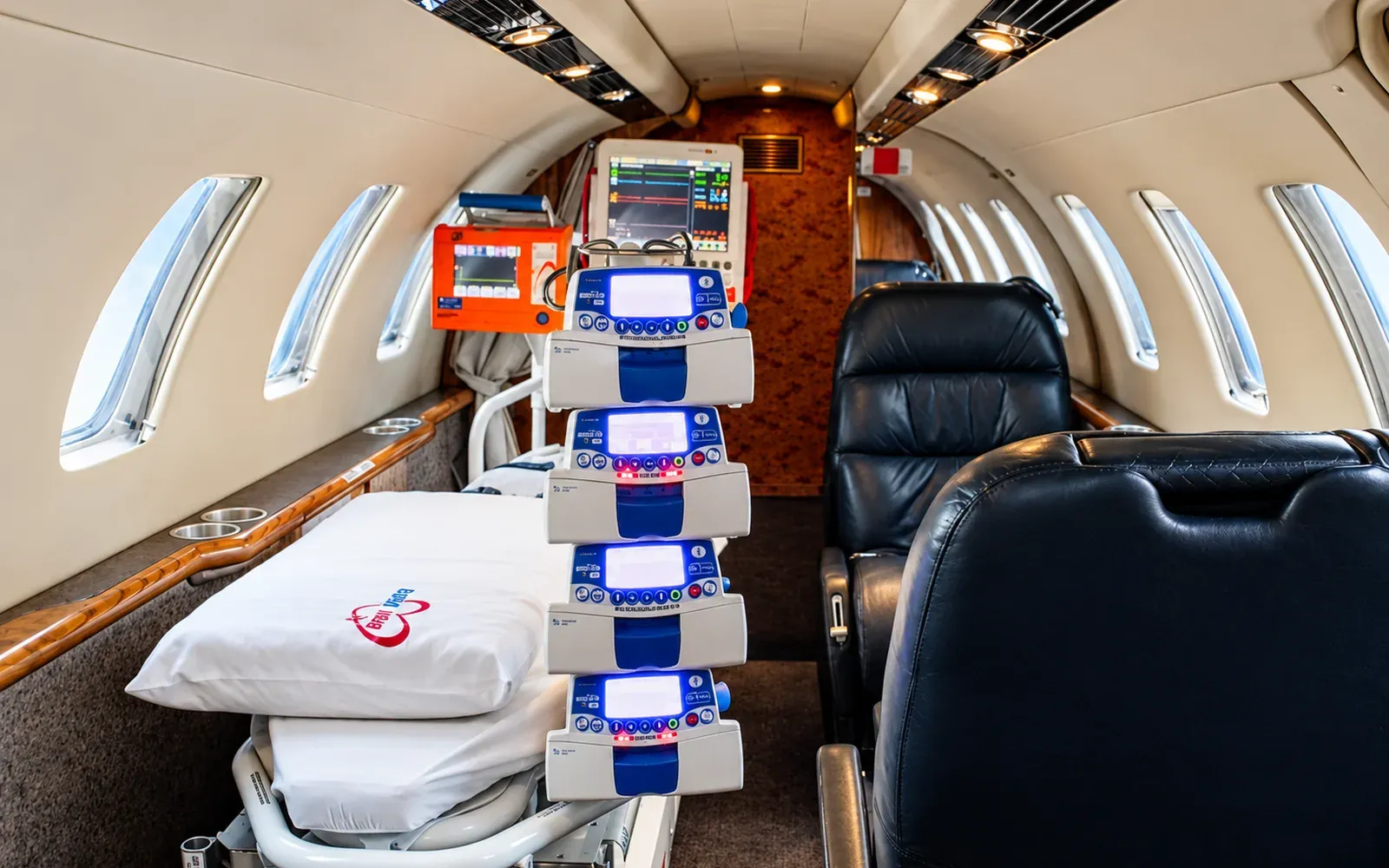 CitationJet cabin in aeromedical configuration with stretcher, patient monitor and infusion pumps