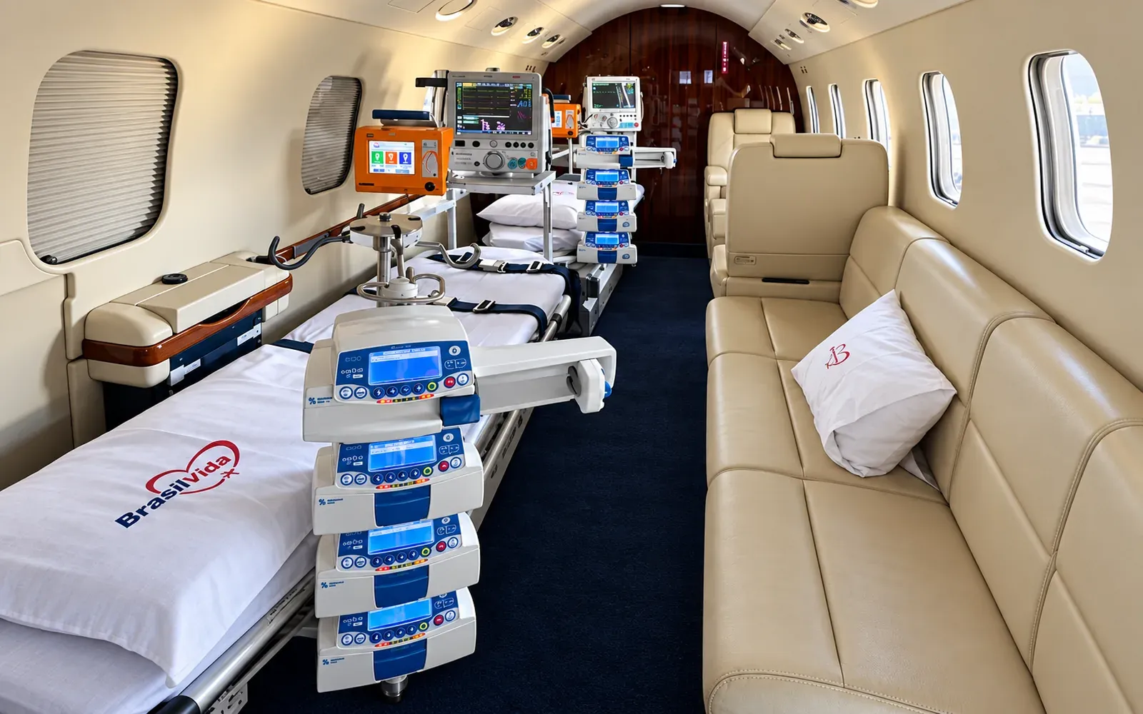 Gulfstream G100 cabin in aeromedical configuration with stretcher, patient monitor and infusion pumps