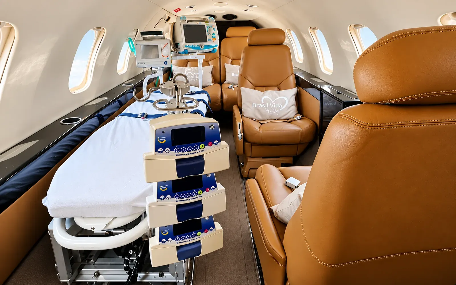 Learjet 31A cabin in aeromedical configuration with stretcher, patient monitor and infusion pumps
